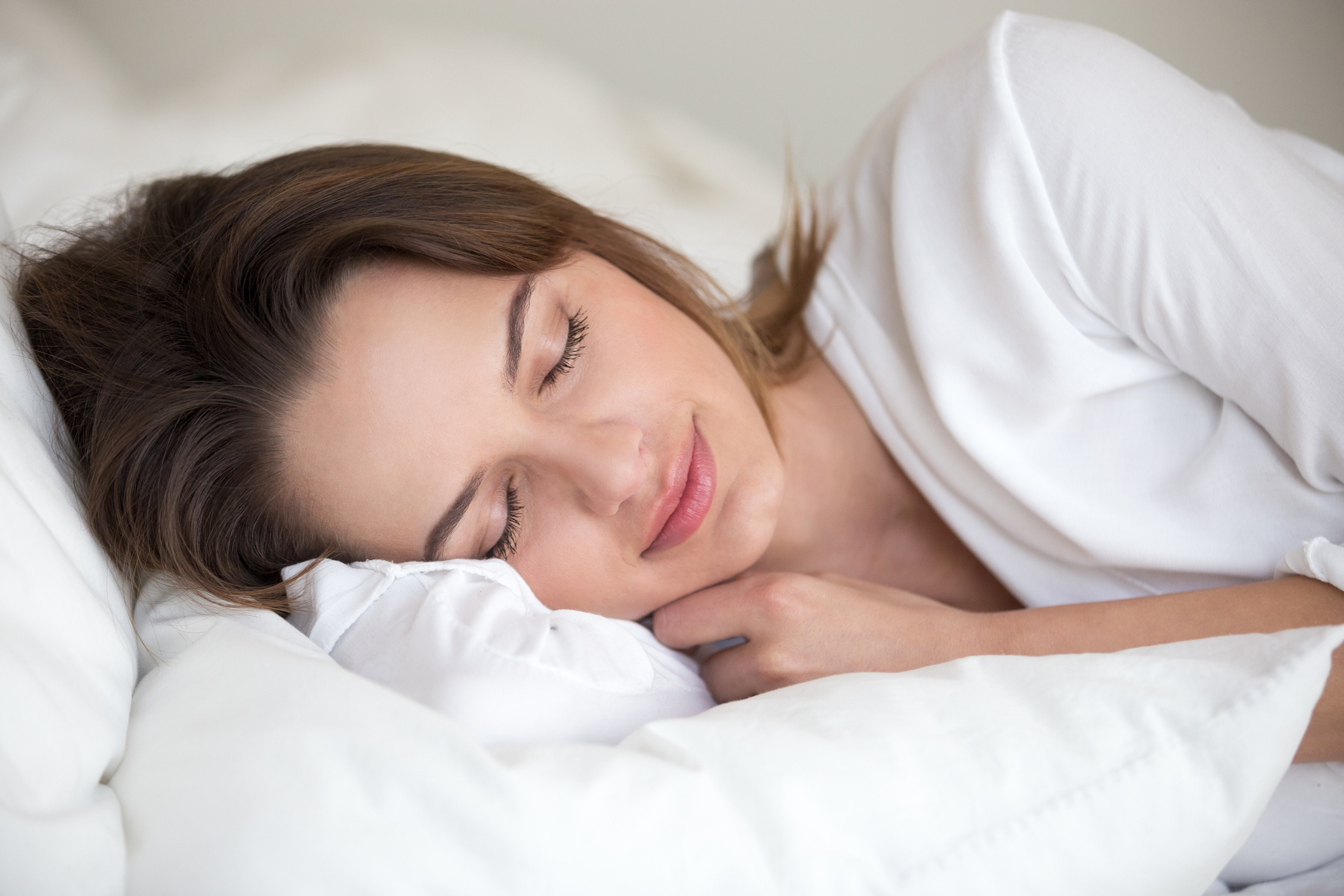 Young Woman Sleeping Well Lying Asleep In Comfortable Cozy Bed Humanitas Salute